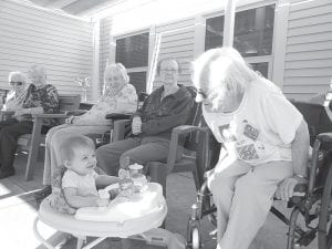 The music was enjoyed by all ages. Little Riley, 10 months old, joined in the fun on the patio for the concert.