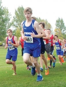 Above: Looking comfortable, Finn Garry (663) races to the finish in the Hibbing cross country meet, helping the varsity team finish in 4th behind some tough teams.