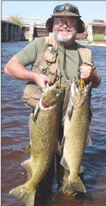 One of Cook County’s best fishermen, Bruce Zimpel, celebrated his 57th birthday by traveling to Manistique, Michigan with his son Brent. Bruce caught these two salmon in the Manistique River, which he estimated to be between 18-20 pounds.