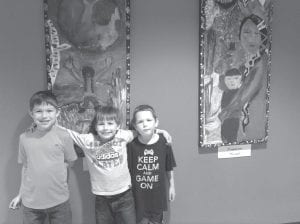 The youths who participated in the Summer Youth Program at the Grand Portage Community Center created a beautiful exhibit reflecting the wisdom of elders—the Seven Grandfather Teachings. The children used bold colors and vivid images of nature—birch and pine trees, cat tails, fish, and birds, including the sacred eagle. By the happy expressions on these young men’s faces at the exhibit opening, they also had a lot of fun.