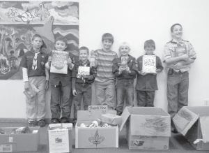 On October 4, Cub Scout Pack #167 held a food drive for the Cook County Food Shelf. They collected several boxes of food, and raised $120. (L-R) Braidy Smith, Wyatt Hadley, Noah Smith, Recko Skildum, Tucker Nelson, Ethan Tate, and Jack Corwin. Pack #167 thanks everyone who helped make our food drive a success!