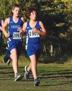 Left: Working together, Trent Spry (2093) and Doren Acero (1903), pushed each other in the Proctor Junior High cross country race finishing the 1½ mile race in 12:22 and 12:27. Above left: Marin Hay ran her 4K race at the Proctor Lion’s Invitational in 21:06 Above right: Finn Garry completed the boys' 5K race in a new personal best time of 19:50 to finish in 37th place. The Section 7A cross country meet was held after press time. More on the Vikings' finish next week.