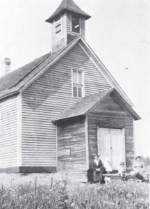 The “Chippewa City Church,” actually the Saint Francis Xavier Catholic Church, was built in 1895. According to the Cook County Historical Society, which is in the process of restoring the historic building, the church was constructed on land donated by Antoine and Antoinette Fillison. Money for the church was raised by basket socials, with baskets made out of birch bark by community members and filled with baked goods. Under the supervision of Father Specht, the building was constructed by Ojibwe carpenter Frank Wiskop with hand-hewn, dovetailed timber. It served as the only Catholic Church in Grand Marais from 1895 – 1916. The building was placed on the National Register of Historic Places in 1985. In 1998 the church building was donated to the Cook County Historical Society which began restoration. Major grants from the Grand Portage Band of Lake Superior Chippewa and the Minnesota Historical Society have helped, but there is much work to be done. The Cook County Historical Society is launching a campaign to restore and preserve this important piece of Cook County history. If you would like to learn more or would like to make a donation toward the restoration, contact Cook County Museum Director Carrie McHugh at (218) 387-2883 or email history@boreal.org.