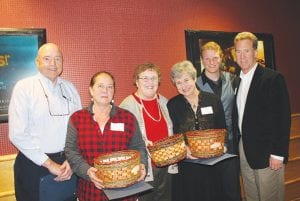 The Cook County Chamber and Visit Cook County Celebrating Optimism event in Grand Portage on October 21 celebrated these business leaders. (L-R) Bruce Kerfoot of Gunflint Lodge, Sarah Hamilton of Camp Chow, Sue Kerfoot of Gunflint Lodge, Skip Joynes, Aaron Carlson, and Jim Joynes of Joynes Ben Franklin.