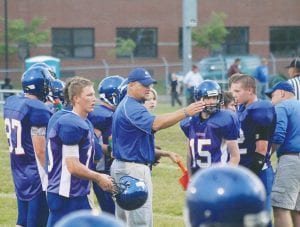 Coach Mike Boomer said he will miss the kids huddled around him getting instructions, but after 21 years of practice and Friday night games, it was time to retire from coaching Cook County High School football. Boomer made his announcement at the end-of-the-year football banquet.