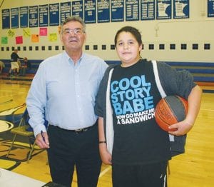 An excited Chance Finke met with hockey legend Henry Boucha last year after Boucha gave a talk at the high school. Boucha is coming to the Grand Marais Public Library on Nov. 21.