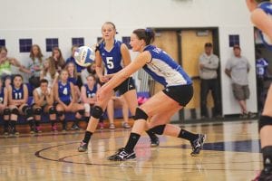 In one of the Vikings’ last games of the season, Linden Sutton bumped the ball while her sister Meredith looked on. Both sisters earned All- Conference for their heady play on the court.