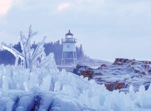 Cook County has not been blessed with all the snow that has been received across the lake, but we have our share of ice along Lake Superior’s shore. Paul Sundberg of Grand Marais ventured onto some slippery rocks to capture this exquisite icy scene.