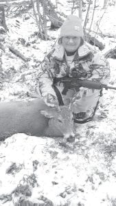 Right: Cook County News-Herald publisher Deidre Kettunen was among the successful hunters this year. She got this 8-point, 175-pound buck on the second weekend of deer season, November 15.