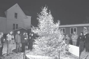 The beautifully lit tree next to Drury Lane Books and the World’s Best Donuts was the centerpiece of a moving Light Up a Life ceremony on Thursday, December 4.