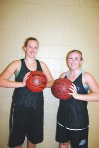 Lily Gruber-Schulz (left) and Jami Sjogren were selected co-captains for the Viking girls’ basketball team this season. The Vikings are off to a 2-0 start