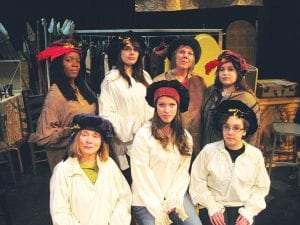 The main cast members of We Happy Few are (L-R, front) Louise Reavis, Melanie Stoddard, Brenna Hay. (L-R, back) Kathy Ann Travis, Aliya Marxen, Beth Faraone, and Erica Marxen. Set in England during World War II, and based on a true story, the actors fill the stage with crisp dialogue and fine acting that does justice to Imogen Stubbs’ great play.