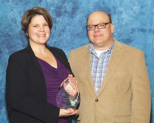 County Attorney Molly Hicken and her husband Paul Nordlund attended the Minnesota County Attorneys Association (MCAA) awards banquet at the Minneapolis Hilton on Thursday, December 4, where Hicken was presented with the MCAA Meritorious Service Award.