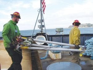 Two members of the Grand Portage Band of Lake Superior Chippewa’s emergency response crew—Cory Hahn and Chris Skildum—traveled to San Francisco Bay in California to participate in testing new rapid response tools for combatting invasive species. Hahn and Skildum are pictured here setting up the testing equipment on the Golden Bear.