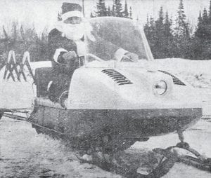 Here comes Santa Claus! Here comes Santa Claus! And he comes the modern way – traveling on a snowmobile to the Grand Marais school for the Chamber of Commerce’s annual Christmas party in December 1964. According to the news report, Santa greeted the children with bags of candy, and a cartoon comedy movie was enjoyed by all. Temperatures were also very wintry-like for Santa’s arrival, with nighttime lows registering 25 degrees below zero. Brrr…..