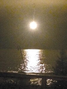 Flares illuminated the Lake Superior shoreline as the search was under way for Wayne Louis Hoffman, who had been pulled into Lake Superior while attempting to rescue another man. His body was recovered at about 10 p.m. Tuesday, December 23.