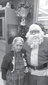 Santa and Mrs. Claus (Trudy Boyd) hosted the Christmas Eve Party at North Shore Care Center.