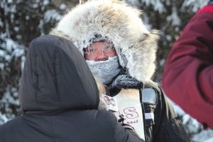 A reporter from Duluth television Channel 10 interviewed a frozen Leanne Bergen at the end of the race at Trail Center. The discussion was brief—Bergen had to tend to her dogs.