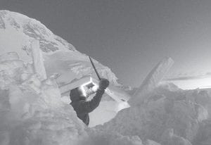 On January 4, Lonnie Dupre spent part of his day building a snow cave at 14,200 feet. Dupre has used this camp several days as he hauled supplies in stages up the mountain. Dupre will make his last camp at 17,200 feet and then wait for good weather to attempt his summit of Mount Denali; at 20,320 feet, Denali is the highest peak in North America.