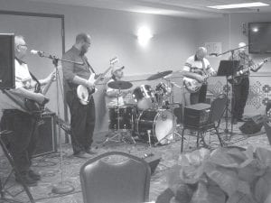 Grand Portage Elders had a busy holiday season. The band Portage provided the entertainment at the Elder’s Christmas party at Grand Portage Lodge. (L-R) rhythm guitarist Butch Deschampe, new bass player Jake McCormick, drummer Joe Peterson, lead singer Jim Spry and lead guitarist Arvid Dahl. These guys always volunteer and are greatly appreciated and enjoyed.