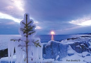 Lake Superior continues to paint the shoreline with amazing ice formations. Grand Marais photographer Paul Sundberg took this photo of a sturdy little pine on the shore in the Grand Marais Recreation Area and appropriately titled it Winter Coat.