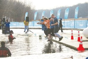 Five Cook County residents joined an Elk River friend to form “Holli’s Hope,” named for 18-year-old Special Olympian Holli McClellan in the Maple Grove Polar Plunge held Saturday, February 7 at Fish Lake. The Holli’s Hope crew raised $2,700 for Special Olympics. Joyous leapers are (L-R) Blake Deneweth, Sara Gale, Lollie Cooper, Bryann Bockovich. Out of the camera view are teammates Linda McClellan (Holli’s mother) and Wellesley Howard-Larsen. See more on page B7.