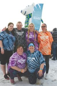 Before taking the Polar Plunge the crew (mostly) from Cook County looked pretty dry and happy. Calling themselves “Holli’s Hope” the six raised $2,700 for Special Olympics by participating in the Maple Grove Polar Plunge on Saturday, February 7. (L-R, front) Linda McClellan and Bryann Bockovich. (L-R, back) Sara Gale, Blake Deneweth, Wellesley Howard-Larsen and Lollie Cooper.