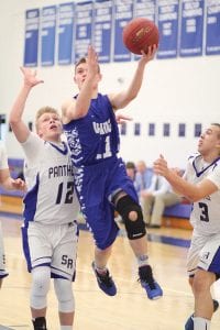 Junior guard Rory Bakke flew past the South Ridge Panther player guarding him to score 2 of his 8 points in the game played in Grand Marais. Bakke came on strong as the season wound down and he will be counted on to help lead the Vikings' basketball team next season.