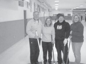 Celebrating after their D event win were (L-R) Brian Smith, Joanne Smith, Rich Palmer, Virginia Palmer.