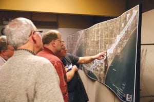 Community members consider changes that could be made to improve the Highway 61 corridor through Grand Marais at a third public meeting on February 24. Citizens were able to see two concept designs that were developed based on past public input. The designs can be seen at http://bit.ly/1HSph3X. Anyone who would like to give comments and suggestions can also do so online. The designs can also be seen at Grand Marais City Hall and comment cards are available there as well.