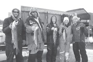 The Cook County Ridge Riders hosted the annual Trout Derby on Gunflint Lake on Sunday, March 8. Winning the fishing contest were (L-R) Jordan Ekroot, Scott “Poot” Houglum, Jade Woltmann, Tasha Johnson, Sherrie Donek. They all won fabulous prizes and Ekroot won the $500 grand prize with his 8 pound, 11 ounce trout.