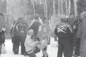 Left: Everyone enjoyed visiting around the bonfire.