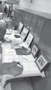 Left: Tables and walls were covered with items to bid on.