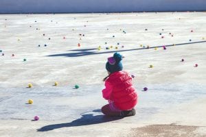 A field of dreams? Younger children searched for bright plastic eggs filled with goodies in the Cook County Community Center hockey rink. This little girl seems a bit overwhelmed by the scene at the Kids Plus Easter Event on Saturday, April 4. The eggs didn’t last long once the preschoolers caught on.