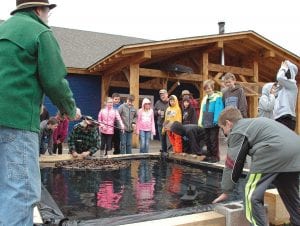 Students come from all over the Midwest, the country and all around the world to participate in classes and activities at North House Folk School. The folk school is also the scene of several interesting classes for local students, such as Paddle to the Sea and Building Toboggans/Winter Survival, or as pictured here, Logging History.