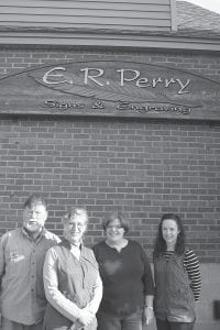 Although the staff at E.R. Perry Signs & Engraving small, their dedication to detail and customer service allow them to compete successfully on a national scale against companies far larger in the sign industry. (L-R) Vilnis Neilands, Elizabeth “Betsy” Perry, Sue Goodell and Carin Gulstrand.