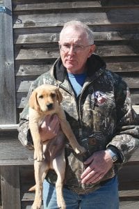 Shawn Perich of Hovland has been reappointed to the Minnesota Forest ResourcesCouncil. Perichisalongstanding member of the council, representing the interests of sportsmen. He is pictured here with his new companion for outdoor adventures, Rainy.