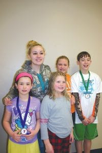 Five members of the Cook County Community YMCA North Shore Rollers competed in the Harold Fischer Memorial log rolling tournament held in Hudson, Wisconsin on Saturday, April 11 and everyone rolled really well. (L-R) Ali Duclos, Wellesley Howard-Larsen, Taylor Everson, Paige Everson and Dominick Wilson.