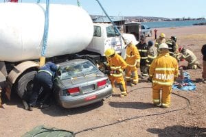 Emergency responders were called to action at a horrific vehicle crash at the Grand Marais Municipal Campground on Saturday, April 25. Fortunately the car-propane truck collision was staged and was just part of the critical training provided for area emergency workers during the 26th annual Cook County Emergency Services Conference in Grand Marais. See more about the conference on page A3.