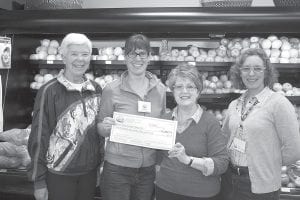 The Cook County Food Shelf got a nice infusion of much needed cash recently from the Cook County Whole Foods Co-op. Although winter is over the food shelf still needs donations of food and money to meet the needs of people who haven’t started seasonal work yet. Food shelf volunteer Gwen Lenz was happy to accept the check. (L-R) Kathy Bolstad, Co-op Director Jennifer Stolz , Gwen Lenz and Jill Levene.