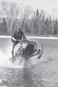 Steve Ortmann of Devil Track Lake shared this photo of a gathering at the lake on Saturday, April 15. He said, “It must be spring, the water skippers were out in force.” Ortmann said some machines made it across the open water; others did not. Those that didn’t make it were promptly pulled out by the crowd in attendance. Josh MacDonnell, pictured here, made several successful crossings. Tony Everson of Grand Marais estimated there were 100 people on hand to watch the action.