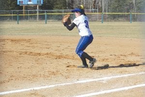 Carrie Palmer gets set to throw a runner out at home plate in a recent game at the Grand Marais Recreation Park. The senior co-captain has been having a great season for the Vikings in the field and at the plate with her bat.