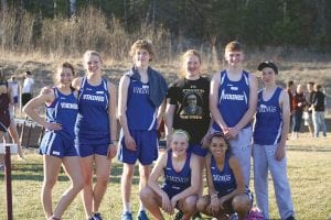 Some of the members of the Cook County High School track team posed for a picture at the Two Harbors meet. L-R, front: Sophie Eliasen and Molly Thomas. L-R, back: Maya McHugh, Lucy Callender, Finn Garry, Chloe Blackburn, Leif Anderson, and Will Surbaugh.