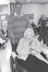 Left: Chet Lindskog takes Donna Willet for a spin on the dance floor. Above: Bob Heideman enjoyed dancing with the lovely ladies, including his daughter, Barb (far left) and Hospital Director Kimber Wraalstad.