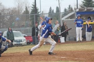 Left: Andrew Lashinski singled against Silver Bay in this at bat. His glove was golden in the game against Ely as he made two outstanding catches in the outfield. Above: Jamie 