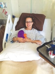 Jenna Latz Wagner, a 2002 Cook County High School graduate now living in Phoenix, Arizona, recently offered an incredible act of kindness—she donated a kidney to a friend’s mother. Jenna is pictured here in the recovery room, holding a whimsical stuffed toy given to her as a get well gift. It’s a kidney!