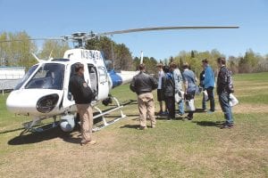 A U.S. Customs and Border Protection AS- 350 helicopter buzzed over the city of Grand Marais and landed on the football field at School District 166 on Tuesday, May 19. There was no reason to be concerned however. The visit was part of Career Day at the school. Academic Counselor Kris Hoffman recruited almost 40 entities— colleges, businesses, governmental agencies like the CBP and more—to the event. See more about Career Day on page B4.