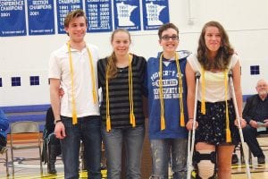 Above: Graduates received the Honor Cords they will wear at commencement exercises on Saturday, May 30. (L-R) Valedictorian Andrew Thompson; High Honor grads Libby Zafft and Brenna Hay and Salutatorian Melanie Stoddard. Left middle: Donna and Orvis Lunke presented a new scholarship this year, the “Make a Difference” award. The inaugural scholarship was presented to Emma Olfson. Lower left: Another new award, the Eric Thomas Emerging Artist Award, is given to a sophomore or junior and provides full tuition for a class at the Grand Marais Art Colony. Isabel Wahlers was the first recipient of the award. (L-R) Art Colony Director Amy Demmer, Isabel, Leah Thomas.