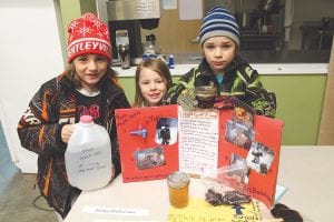 The Great Expectations Project Fair in April was small, but interesting. Jordan Backstrom (on right) and his brother Parker had a display on “Making Maple Syrup at Home.” With them is their little sister Jorjah.