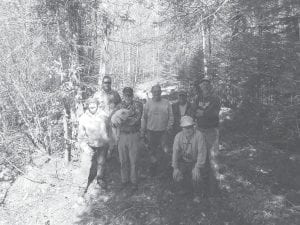 Trail clearing has begun on the South Fowl Snowmobile Access, which will serve as a winter connection between McFarland and South Fowl lakes. Volunteers from the Arrowhead Coalition for Multiple Use and U.S. Forest Service personnel worked together on the trail on May 30. (L-R) Diane Greeley, Eric Nelms, John McClure, Gary Trovall, Jeff DeShaw, Chuck Silence (front), Tom Kaffine. (Not pictured U.S. Forest Service Recreation Specialist Jon Benson.)